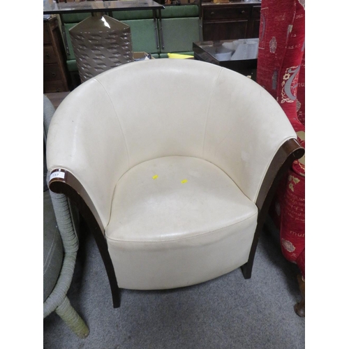 757 - AN UPHOLSTERED TUB CHAIR