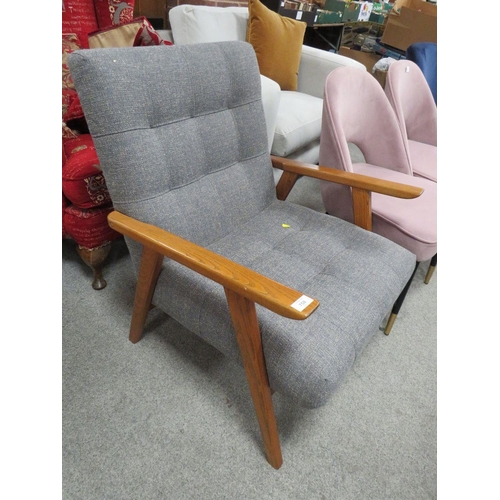 758 - A MODERN UPHOLSTERED ARMCHAIR