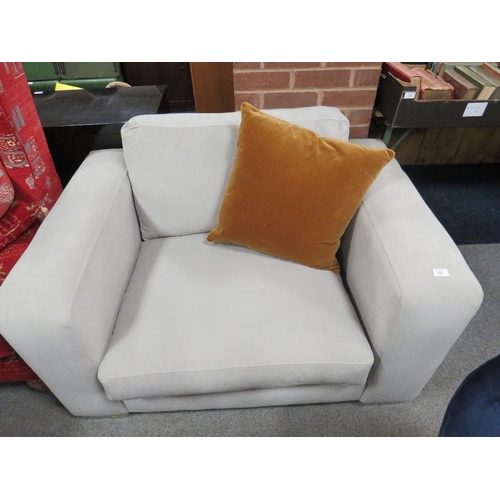 761 - A LARGE MODERN SQUARE UPHOLSTERED ARMCHAIR