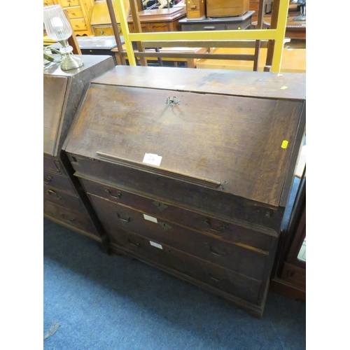 767 - A 19TH CENTURY OAK COUNTRYMADE BUREAU - 'ST MARYS ABBEY'