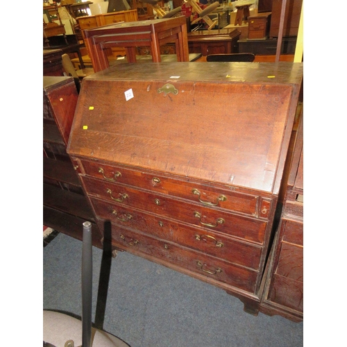 768 - A 19TH CENTURY OAK COUNTRYMADE BUREAU - 'ST MARYS ABBEY'