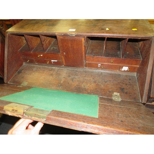 768 - A 19TH CENTURY OAK COUNTRYMADE BUREAU - 'ST MARYS ABBEY'