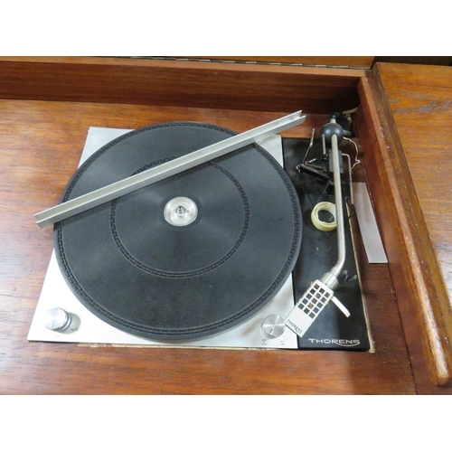 776 - A MID CENTURY TEAK SIDEBOARD / RADIOGRAMME WITH THORENS RECORD DECK - W 190 CM A/F