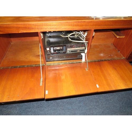 776 - A MID CENTURY TEAK SIDEBOARD / RADIOGRAMME WITH THORENS RECORD DECK - W 190 CM A/F