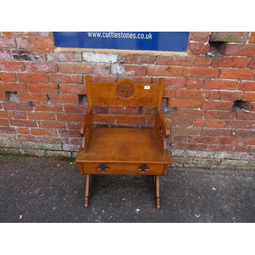 785 - A CARVED OAK ECCLESIASTICAL CHURCH LOW ARMCHAIR  - 'ST MARYS ABBEY'