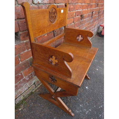 785 - A CARVED OAK ECCLESIASTICAL CHURCH LOW ARMCHAIR  - 'ST MARYS ABBEY'