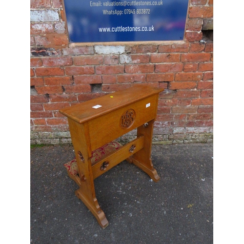 790 - AN OAK CARVED ECCLESIASTICAL PRAYER STAND WITH FOLD DOWN KNEE STAND  - 'ST MARYS ABBEY'