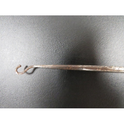 346 - A LARGE SILVER HANDLED BUTTON HOOK AND SILVER WINE LABEL