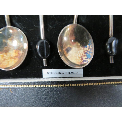 355 - A CASED SET OF SIX SILVER COFFEE BEAN SPOONS