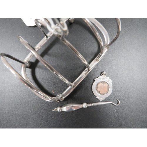 356 - A SMALL SILVER TOAST RACK, SILVER FOB AND SILVER HANDLED BUTTON HOOK