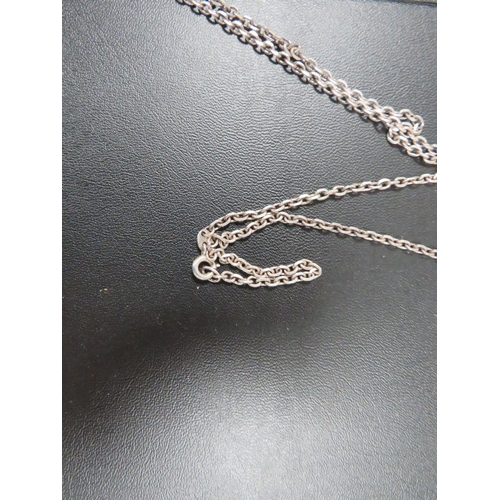 359 - AN ANTIQUE SILVER VESTA CASE ON SILVER CHAIN