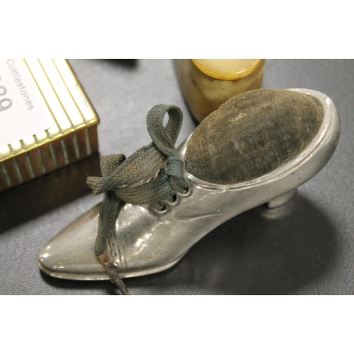 389 - TWO VINTAGE HORN SNUFF BOXES TOGETHER WITH BRASS STAMP BOX AND A PIN CUSHION IN THE FORM OF A SHOE