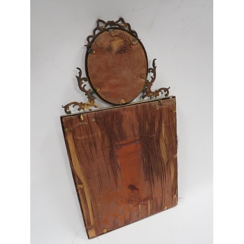 412 - A VICTORIAN BRASS FRAMED MIRROR