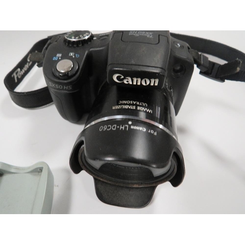 431 - A CANON DIGITAL CAMERA SX50 HS TOGETHER WITH A BATTERY AND CHARGER (UNCHECKED)