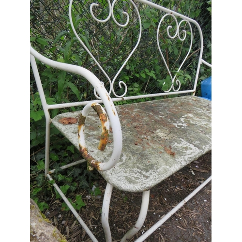 607 - A TWO SEATER WROUGHT IRON GARDEN BENCH