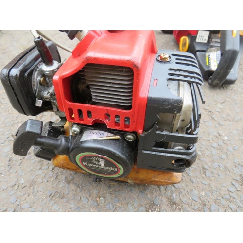 641 - A KAWASAKI TG24 PETROL STRIMMER AND A HOMELITE PETROL CHAINSAW (2)