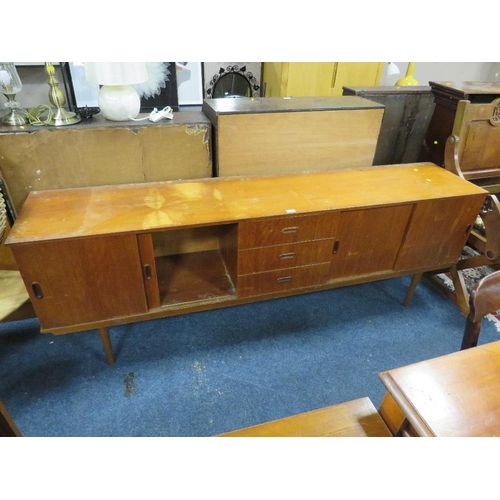 793 - A MID CENTURY TEAK SIDEBOARD WITH SLIDING DOORS - W 213 CM A/F