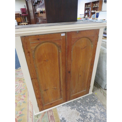 845 - A VINTAGE PINE TWO DOOR CABINET