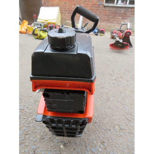 657 - A FLYMO MAXI TRIM PETROL STRIMMER