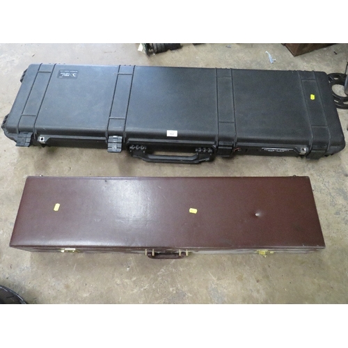 682 - TWO GUN CASES COMPRISING ONE HARD PLASTIC AND ONE WOOD & VINYL