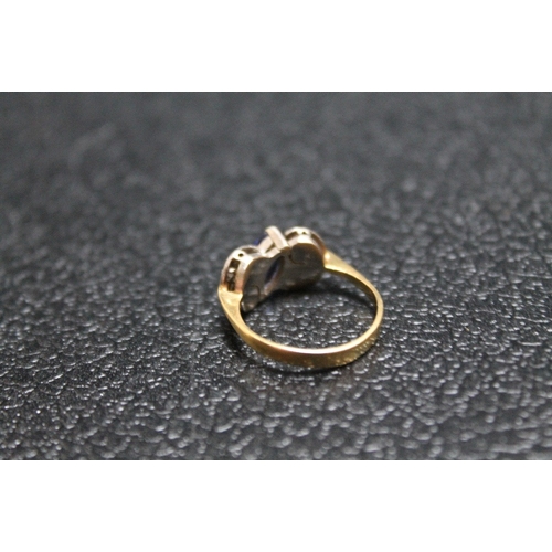 83 - A HALLMARKED 18 CARAT GOLD SAPPHIRE AND DIAMOND RING, approx weight 4.1g, ring size M