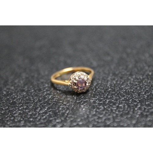 84 - A HALLMARKED 18 CARAT GOLD AMETHYST AND DIAMOND RING, approx weight 3.4g, ring size O