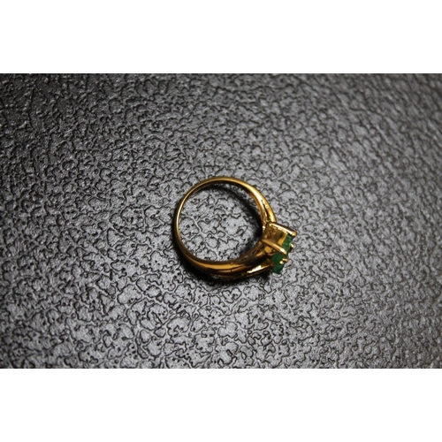 96 - A 14K YELLOW METAL EMERALD AND DIAMOND RING, approx weight 4g, ring size K 1/2