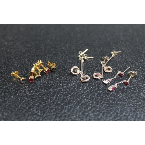 101 - THREE PAIRS OF YELLOW METAL STUD EARRINGS, set with semi precious stones, approx weight 3.1g, togeth... 