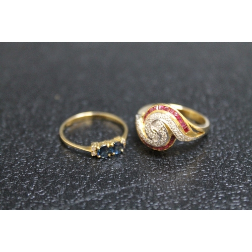 106 - TWO 14K YELLOW METAL RINGS CONSISTING OF A RUBY AND DIAMOND 'SWIRL' PATTERN RING,  approx weight 4.9... 