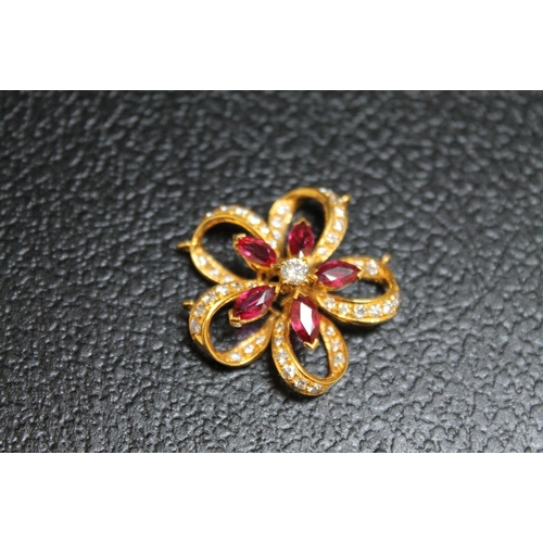 107 - A RUBY AND DIAMOND PENDANT, set in unmarked yellow metal, approx weight 8.4g, Dia 3 cm