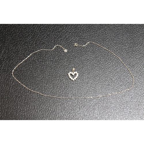 113 - AN 18CT WHITE GOLD CHAIN WITH 925 SILVER HEART SHAPED PENDANT, chain approx weight 2.2g, L 40.5 cm