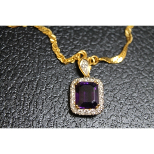 114 - AN AMETHYST AND DIAMOND PENDANT, set in unmarked yellow metal on an unmarked yellow metal chain with... 