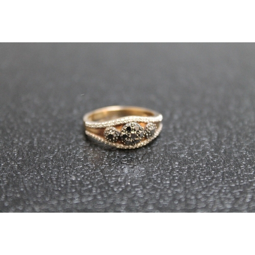 118 - A WHITE AND BLACK DIAMOND SET DRESS RING, set in unmarked yellow metal, approx weight 2.9g, ring siz... 