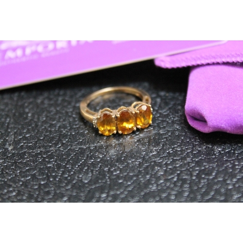 119 - A 9K GOLD 'SPHENE' AND DIAMOND RING, with accompanying card certificate from Gemporia, approx weight... 