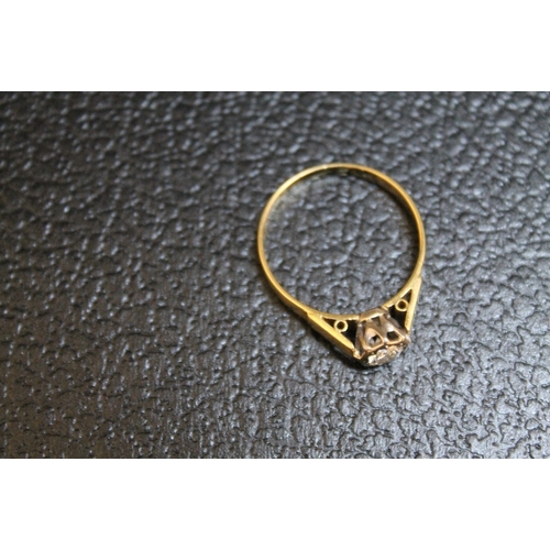 122 - AN 18CT GOLD DIAMOND SOLITAIRE RING, in an illusion setting, approx weight 3.1g, ring size R