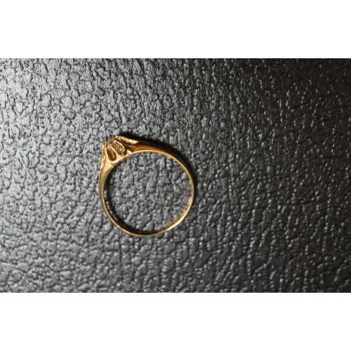 123 - A HALLMARKED 18 CARAT GOLD DIAMOND SOLITAIRE RING, the oval diamond being in a claw setting, approx ... 