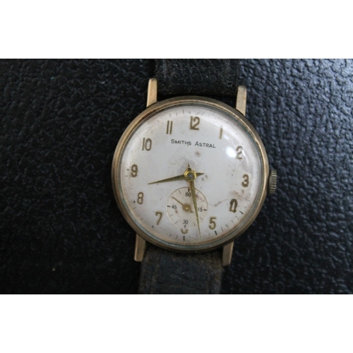 159 - A 9 CARAT GOLD SMITHS ASTRAL WRIST WATCH, with presentation engraving to back cover, Dia 3.5 cm