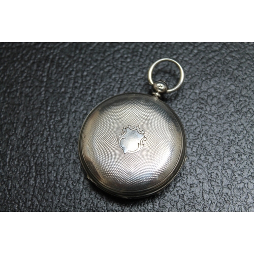 167 - A HALLMARKED SILVER OPEN FACED MANUAL WIND POCKET WATCH, with decorative silver dial, Dia 3.75 cm