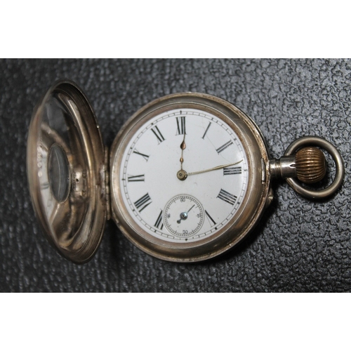 169 - A CONTINENTAL SILVER HALF HUNTER POCKET WATCH, Dia 4.5 cm