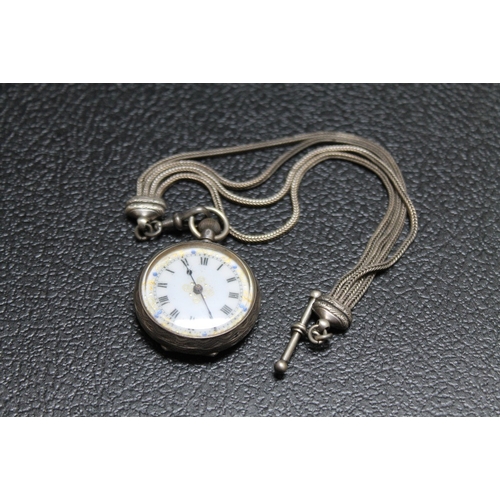 170 - A HALLMARKED SILVER FOB WATCH, on a white metal albertina chain, Dia 3 cm