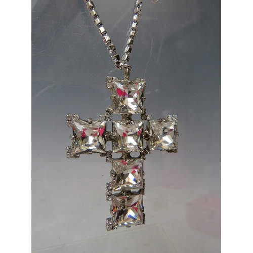 22 - TWO BUTLER AND WILSON CROSS THEMED PENDANT NECKLACES, the largest pendant H 10 cm, together with a b... 