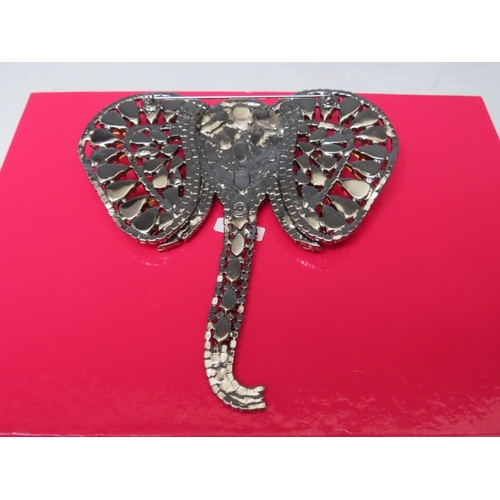 27 - A LARGE BUTLER AND WILSON CLEAR DIAMANTE ELEPHANT BROOCH, with articulated trunk, W 11.5 cm