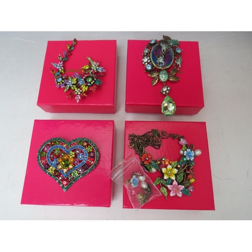 28 - FOUR BUTLER AND WILSON COSTUME BROOCHES, comprising a multi-coloured heart brooch - W 8.2 cm, a frog... 