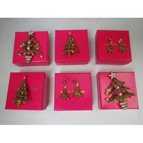 30 - A COLLECTION OF SIX BUTLER AND WILSON CHRISTMAS THEMED JEWELLERY ITEMS, comprising four Christmas tr... 