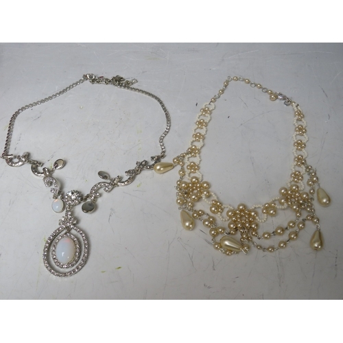 4 - A COLLECTION OF BUTLER AND WILSON JEWELLERY ITEMS, to include a necklace and earring set, pearl effe... 