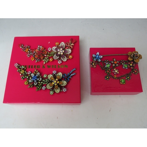 43 - TWO BUTLER AND WILSON FLORAL SPRAY ARTICULATED BROOCHES, L 14.5 cm, together with a similar kilt pin... 