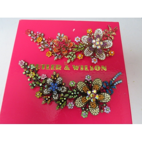 43 - TWO BUTLER AND WILSON FLORAL SPRAY ARTICULATED BROOCHES, L 14.5 cm, together with a similar kilt pin... 