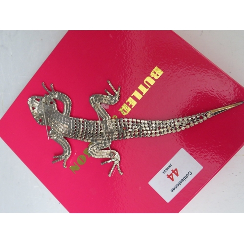 44 - A BUTLER AND WILSON ARTICULATED LIZARD BROOCH, L 18 cm