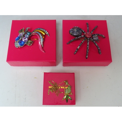 45 - TWO BUTLER AND WILSON ANIMAL THEMED BROOCHES, comprising a large spider brooch Dia. 9 cm and a multi... 