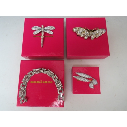 48 - A SELECTION OF BUTLER AND WILSON JEWELLERY, to include a dragonfly brooch - W 6.5 cm, a butterfly ha... 